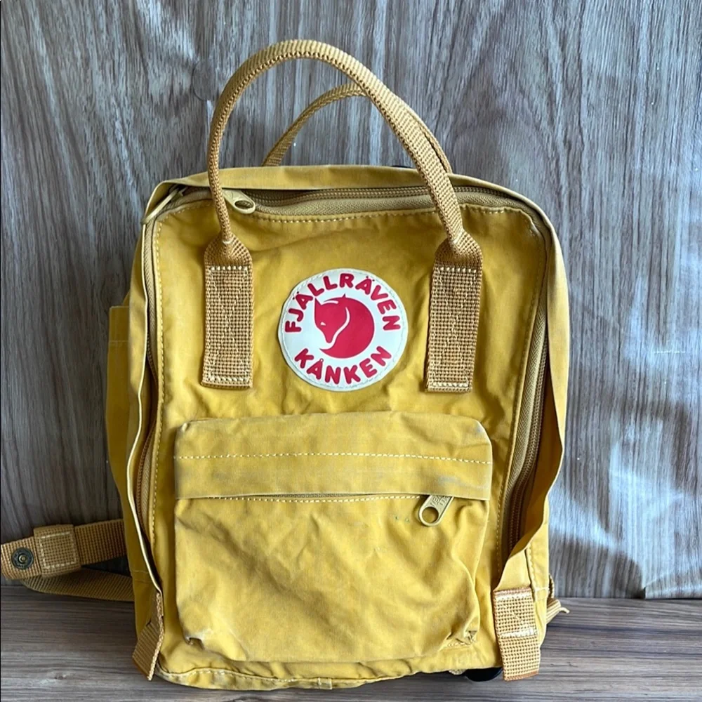 Pre-owned Kånken Yellow Backpack condition see the pictures